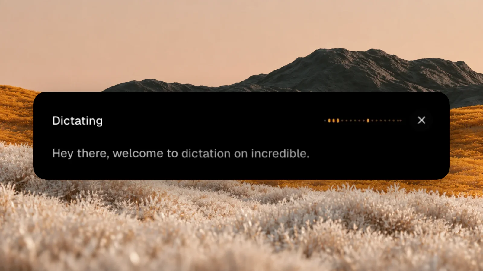 The Incredible dictation bar listening, with a waveform and the words "Hey there, welcome to dictation on incredible." typed out